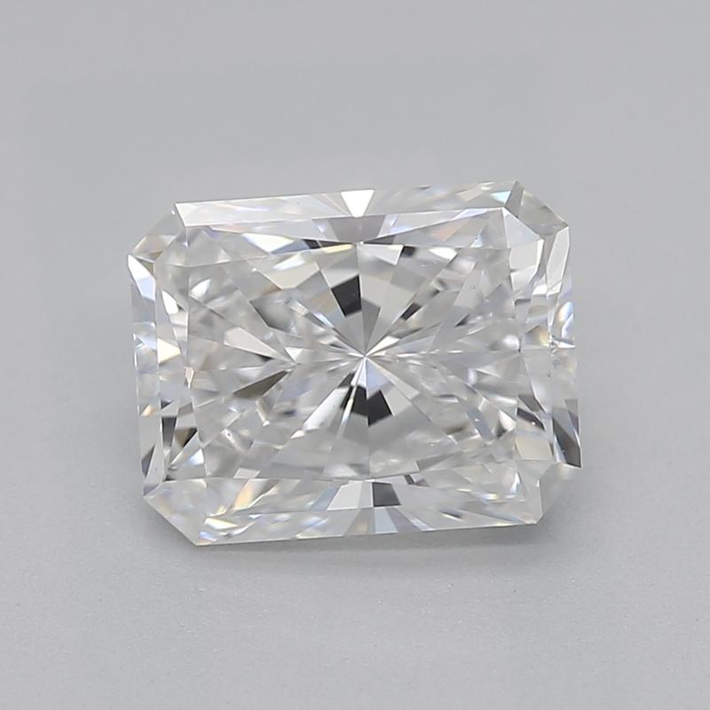 Handcrafted in New York, this exquisite diamond ring showcases a captivating radiant E VS2 1.18 center stone, brilliantly set in a classic four-prong setting that elevates its radiant beauty. The ring is elegantly adorned with shimmering tapered