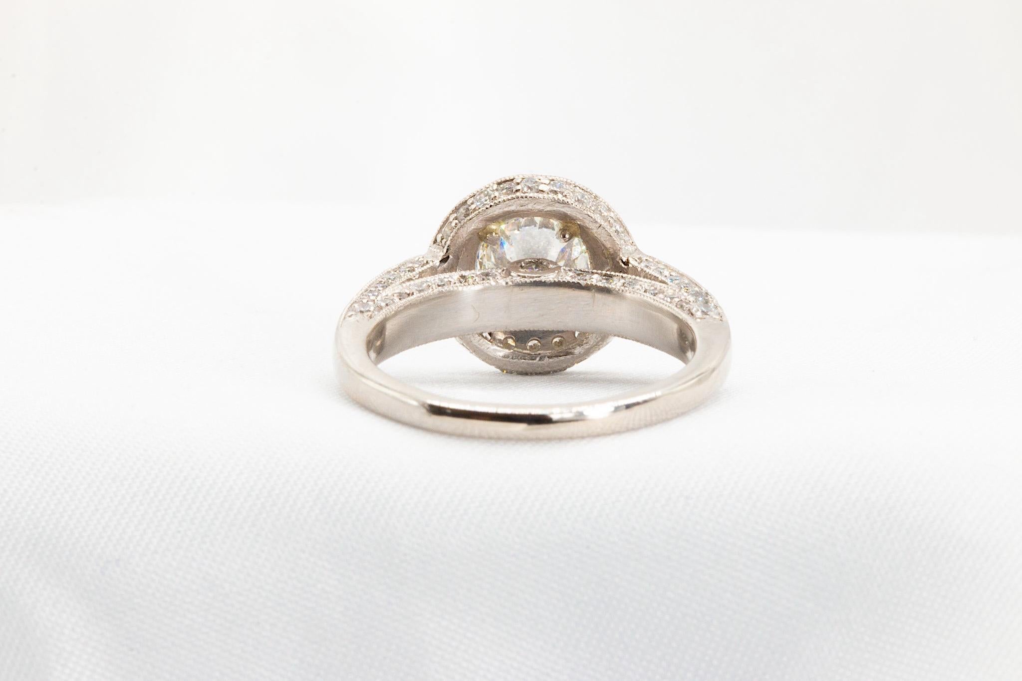 GIA Certified 1.18 Carat Round Brilliant Diamond in Platinum and Diamond Ring In Good Condition For Sale In Houston, TX