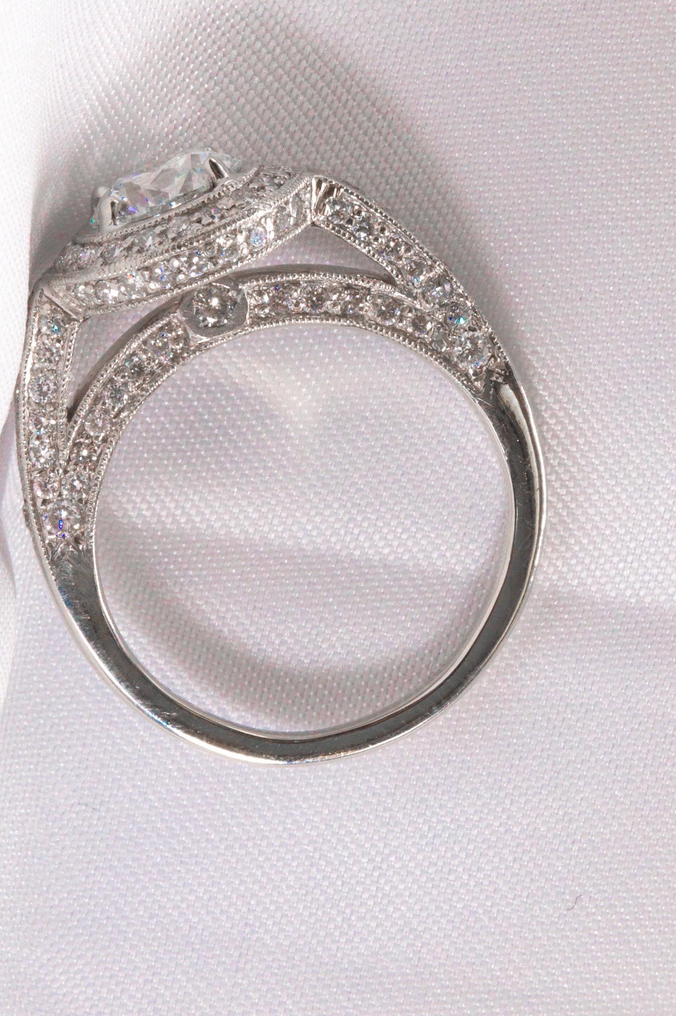 Women's GIA Certified 1.18 Carat Round Brilliant Diamond in Platinum and Diamond Ring For Sale