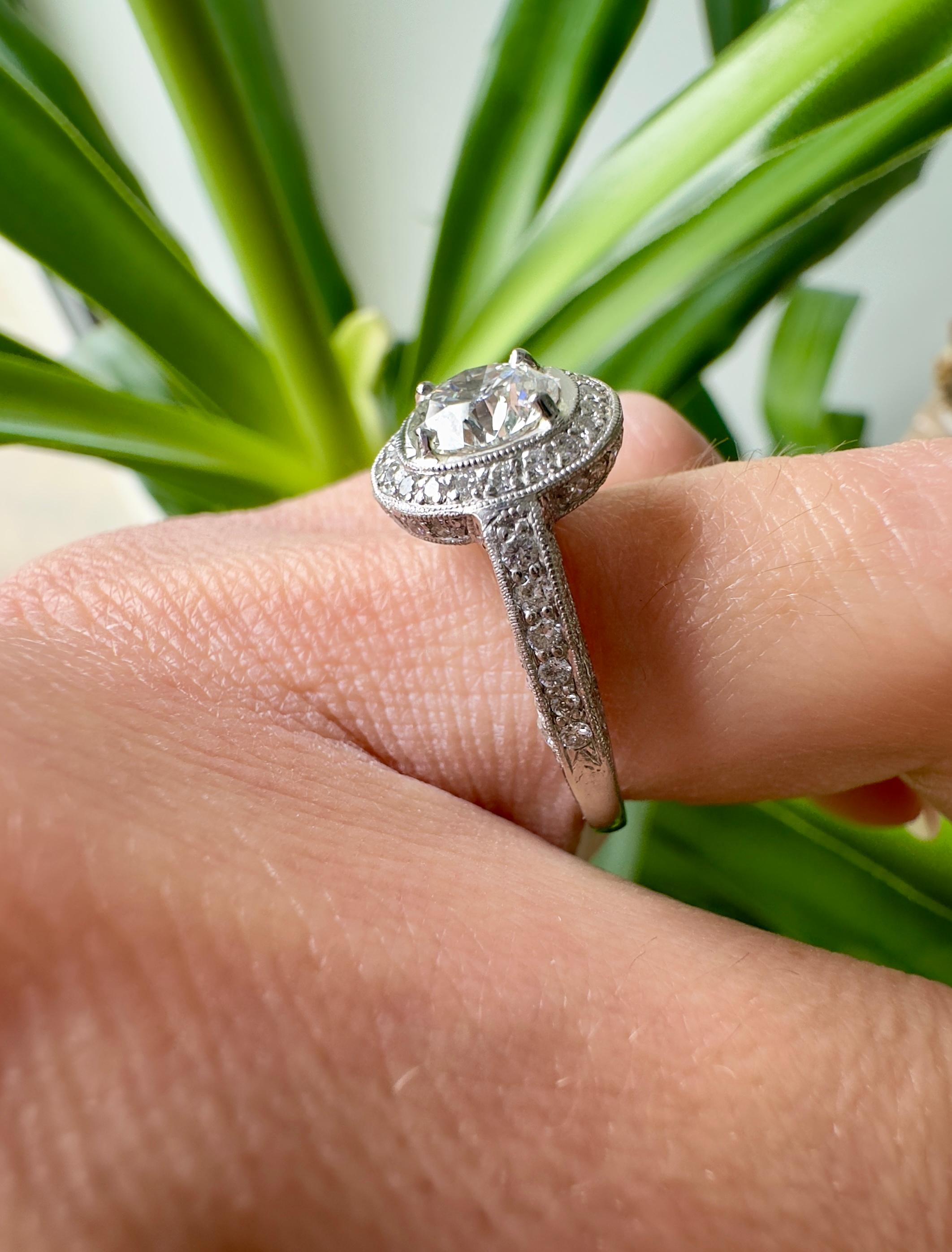 GIA Certified 1.18 Carat Round Brilliant Diamond in Platinum and Diamond Ring For Sale 3