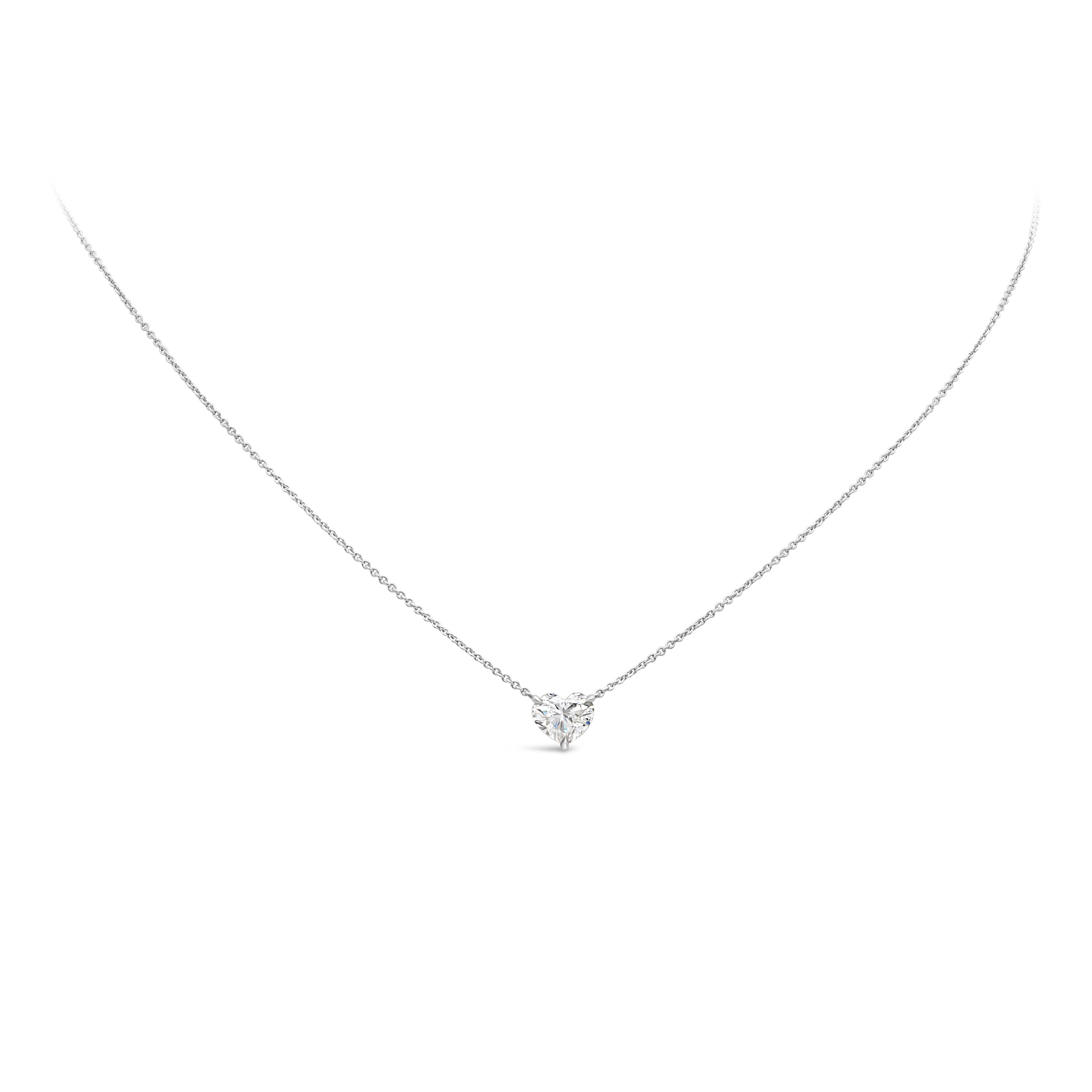 A classic pendant necklace showcasing a GIA Certified 1.18 Carats heart shape diamond, J color and SI2 in clarity. Set in a polished Platinum basket mounting. Suspended on an 16 inches adjustable 18K White Gold chain. Perfect for your everyday