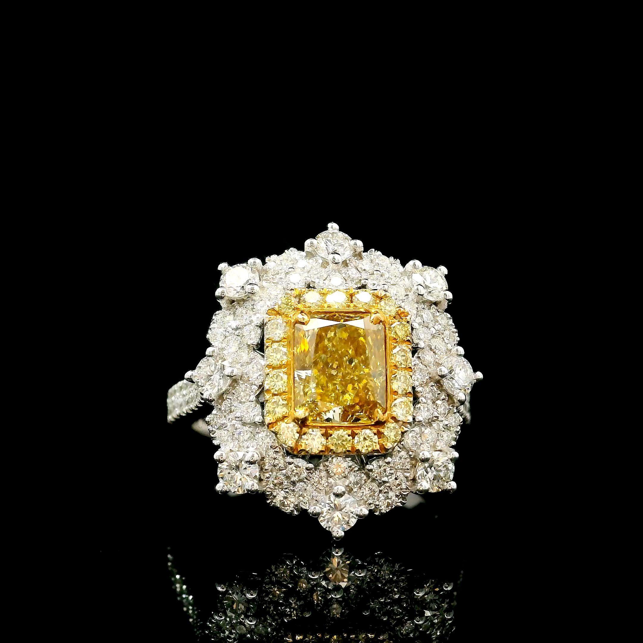 18kt white gold ring with diamonds
  
  Gold colour & karat: White gold 18kt
  Weight: 5.78 grams
  
  Set with-
  Stone type: Diamonds
  Shape: Radiant
  Carat: 1.19 ct
  Colour: Fancy Brownish Yellow
  Clarity: VS1
  
  Surrounding Stones: