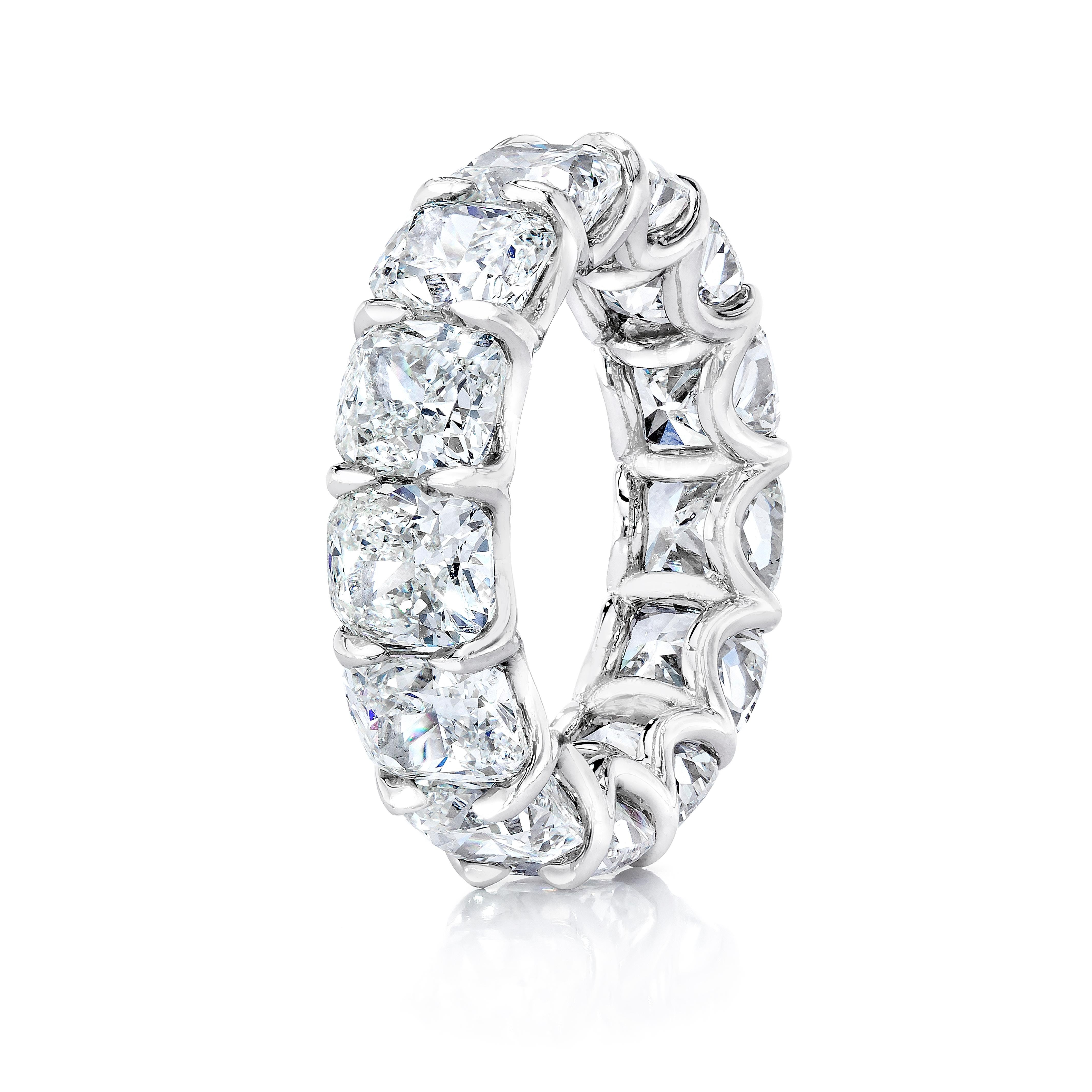 13 Cushion Cut Diamonds weighing 13.10 Carats. Stone are of D-F Color and VS-VVS Clarity.
Set in Platinum.

Ring can be sized slightly or a new setting can be made to accommodate any finger size.
Also available and/or can be made to order in