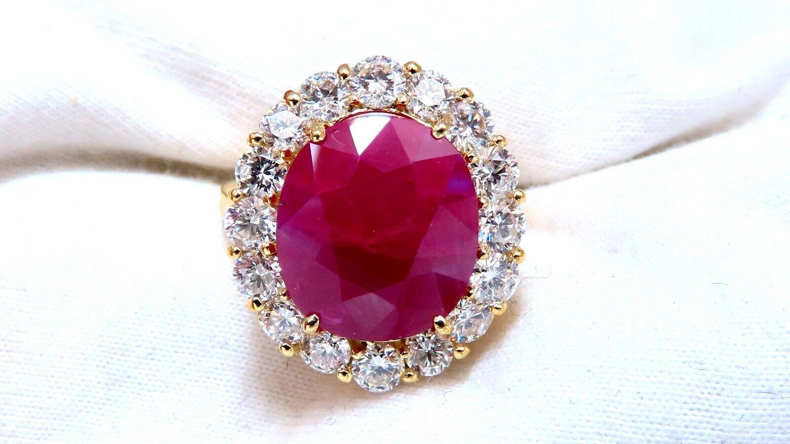 GIA certified oval shape ruby ring.

Semi Translucent,  purple -red color.

14.4x12.84mm.

GIA certificate to accompany.

2.63ct natural side round diamonds.

G-color, vs2-clarity

14 karat white gold

Depth of ring 9.2 mm

Deck of ring: 22 x