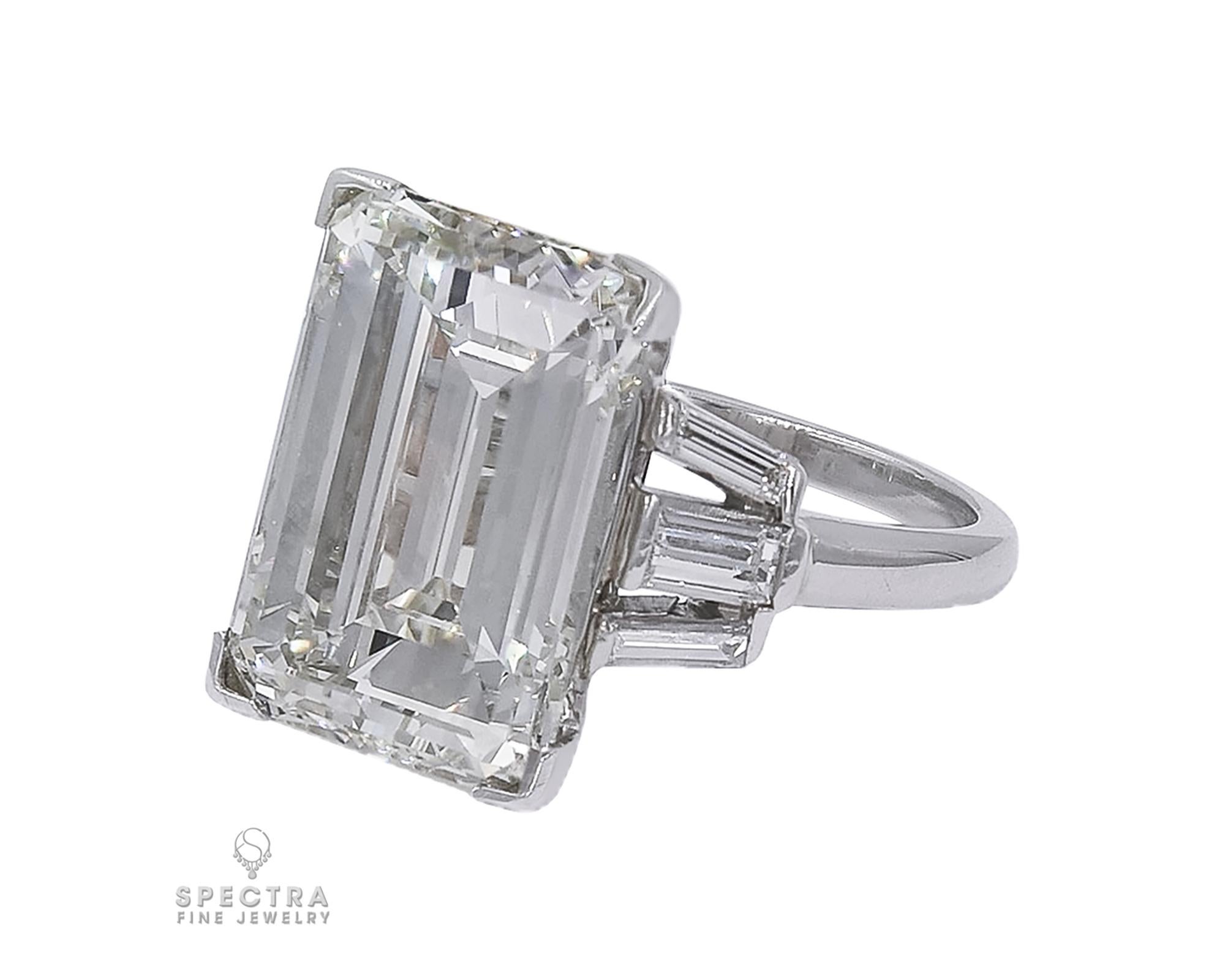 A stunning engagement ring boasting an emerald-cut diamond weighing 11.96 carats.
Accompanied by a GIA report stating that the diamond is of O-P color, VS1 clarity.
6 tapered baguette diamonds on the sides.
Metal is 18k white gold.
Gross weight is
