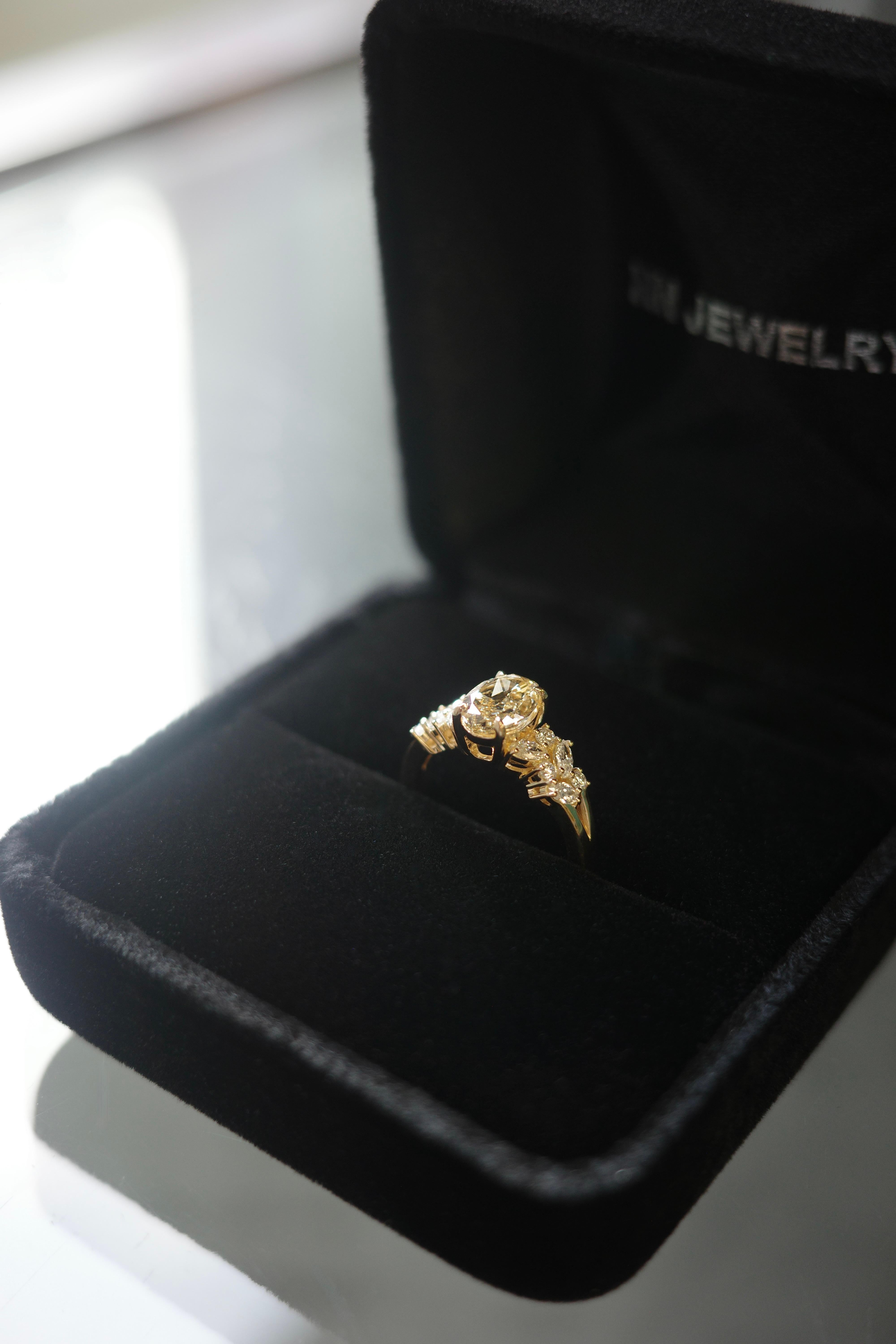 For Sale:  GIA Certified 1.19ct Oval Fancy Yellow Diamond and Marquise Diamond Ring 4