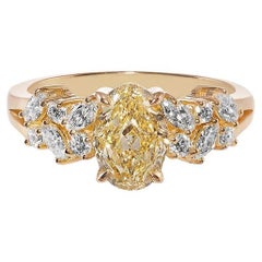 GIA-zertifizierter 1,19 Karat ovaler Fancy Gelber Diamant und Marquise-Diamantring
