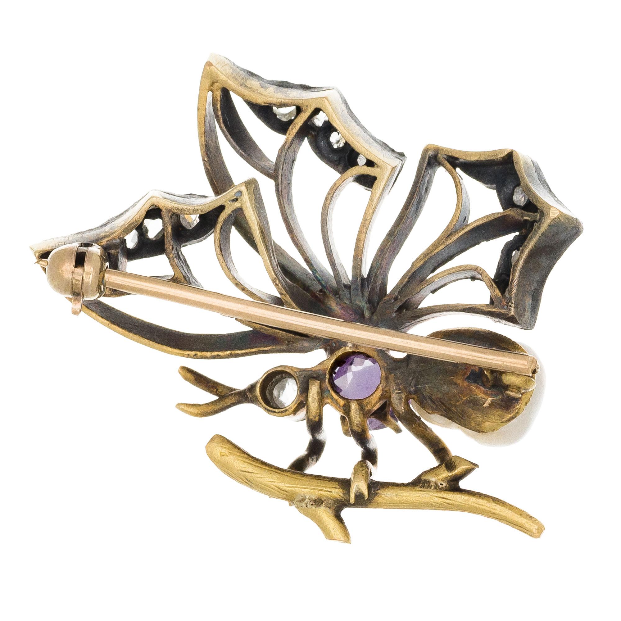 1910 Art Nouveau butterfly brooch. 18k yellow gold with silver tops set with 12 rose cut diamonds, Amethyst and a GIA certified natural untreated saltwater pearl. Natural patina

1 natural white saltwater baroque pearl, 6mm GIA Certificate #