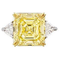GIA Certified 12 Carat Emerald Cut Fancy Yellow Diamond Trillion side Ring