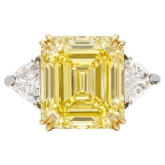 GIA Certified 12 Carat Fancy Yellow Emerald Cut Diamond Three-Stone Ring