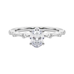 Anello di diamanti con gambo di bambù e diamante ovale da 1.2 carati certificato GIA