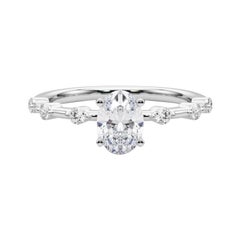 Anello di diamanti in platino con gambo di bambù e diamante ovale da 1.2 carati certificato GIA