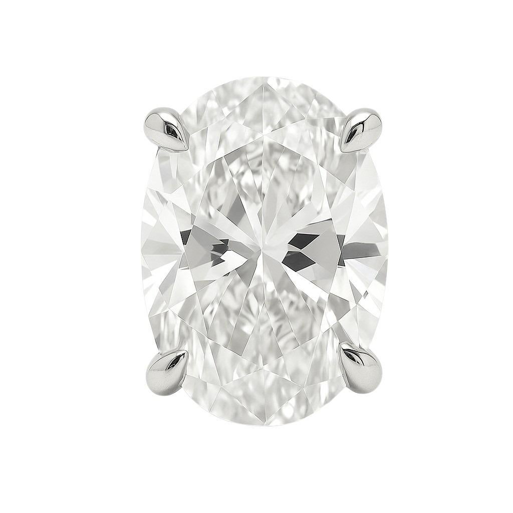 A breathtaking pair of stud earrings showcasing two GIA-certified oval brilliant cut diamonds, each weighing just over 6 carats. One diamond is graded F color, SI1 clarity and the other D color, SI1 clarity, both with excellent to very good polish