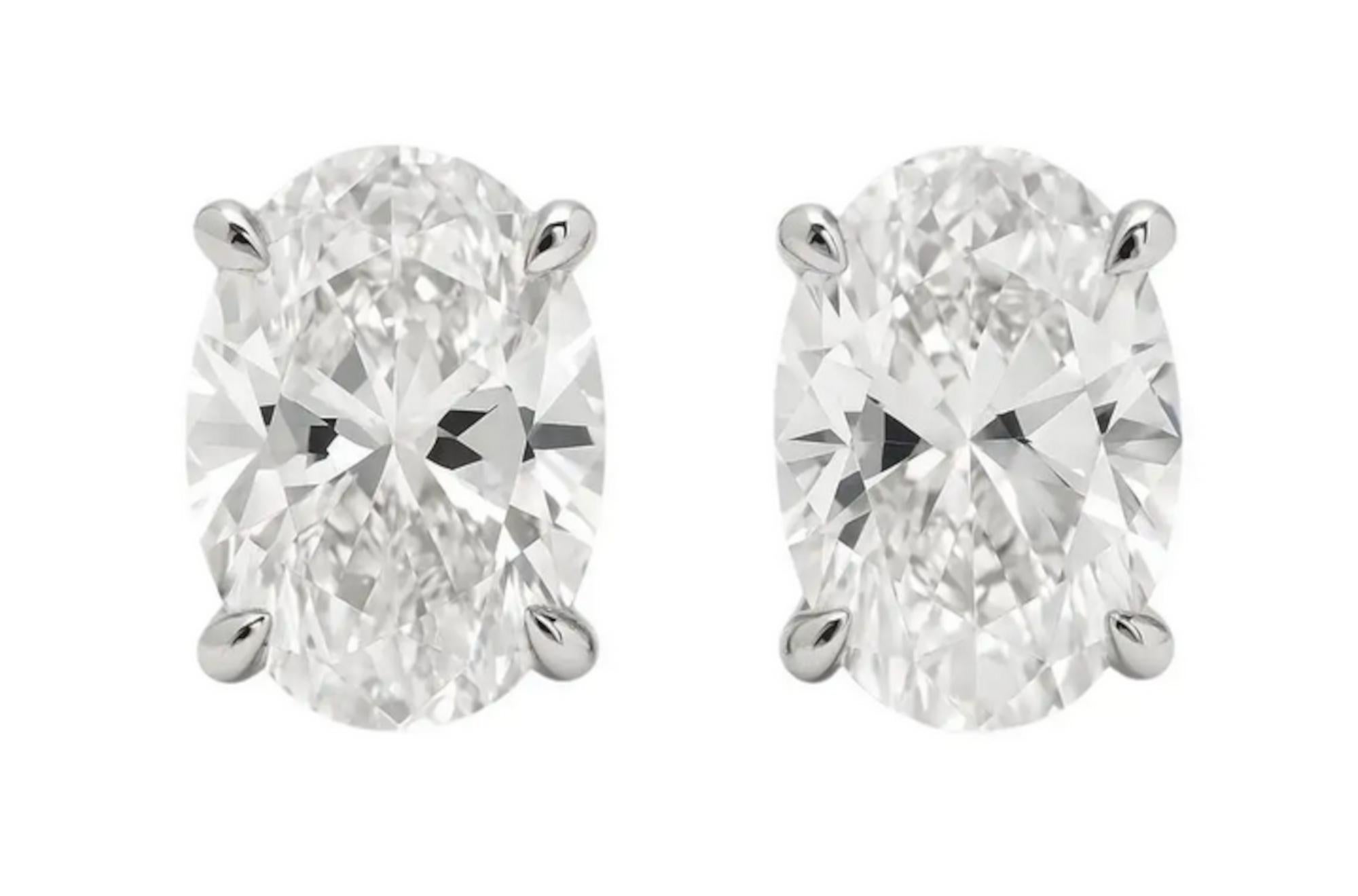 Oval Cut GIA Certified 12 Carat Oval Diamond Platinum Stud Earrings For Sale