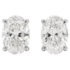 GIA Certified 12 Carat Oval Diamond Platinum Stud Earrings