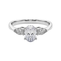 Anello con diamante ovale est-ovest a tre pietre certificato GIA da 1,2 carati