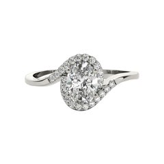 GIA Certified 1.2 Carat Oval Halo Curved Bypass Shank Platinum Diamond Ring
