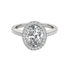 Bague à diamant en or blanc 18 carats certifiée GIA de 1,2 carat avec halo ovale et panier filigrané