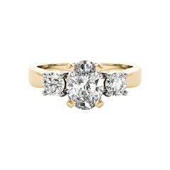 GIA Certified 1.2 Carat Oval & Round Three-Stone Yellow Gold Diamond Ring (bague à trois pierres en or jaune 18K)
