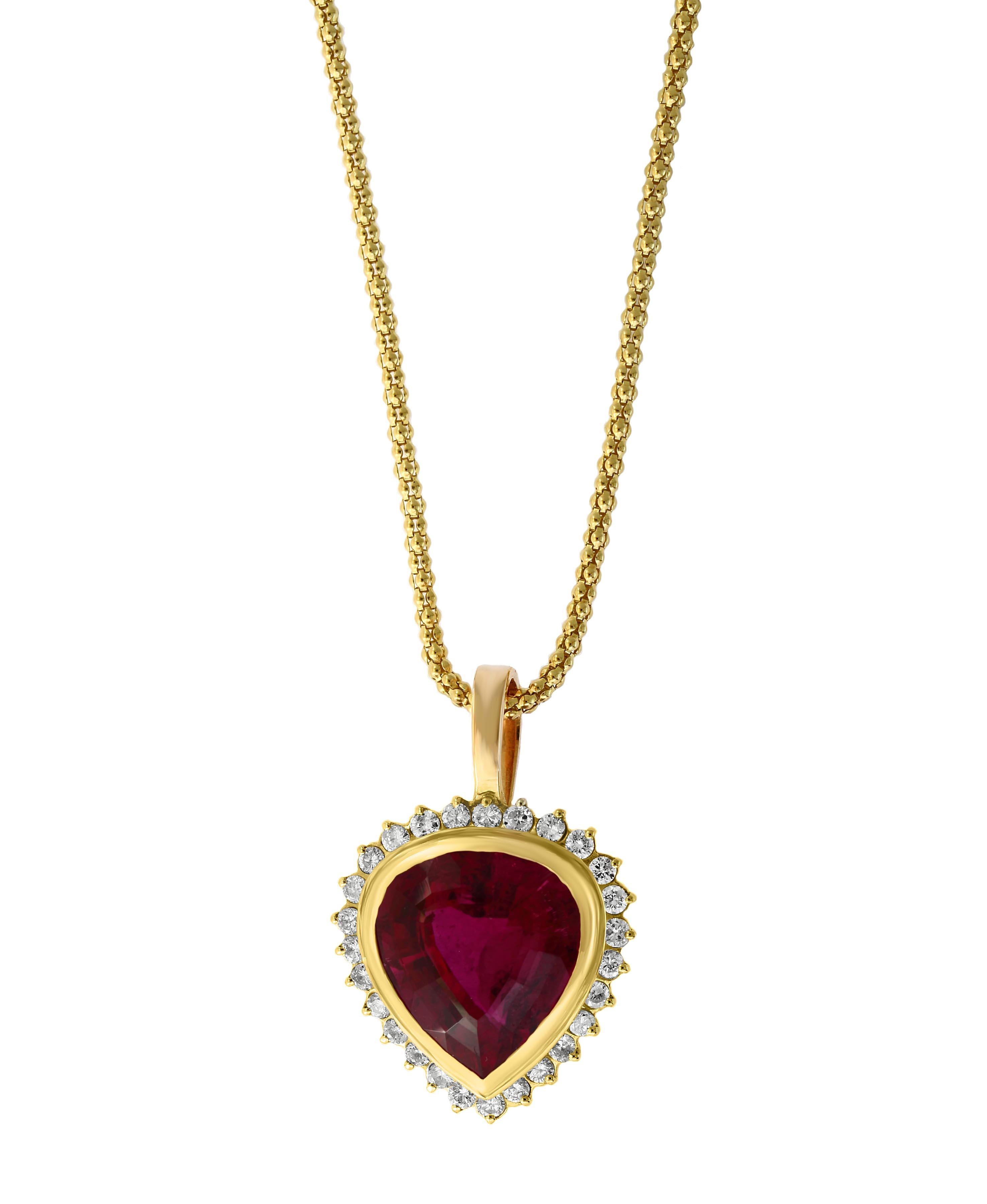12 Carat Pear Cut Pink Tourmaline and Diamond Pendant Necklace Enhancer
GIA Certified 
Report # 5192640764
This spectacular Pendant Necklace consisting of a single Pear Shape Pink Tourmaline also know as Rubelite , approximately 12 Carat. The Pink