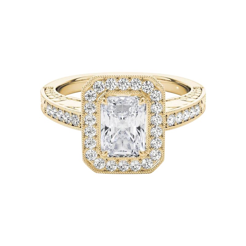 Anello con diamante radiante aureolato inciso e traforato certificato GIA da 1.2 carati