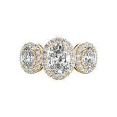 GIA Certified 1.2 Carat Three-Stone Oval Halo Basket Set Diamond Ring