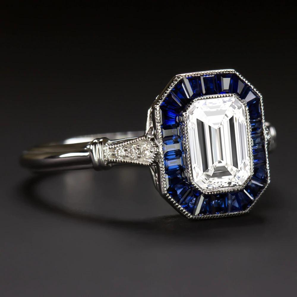 Stunning vintage inspired semi-mount is beautifully designed with gorgeous contrast and color! The chic geometric setting is set with rich blue custom cut natural sapphires. Finished with fine milgrain details, this bezel setting provides the