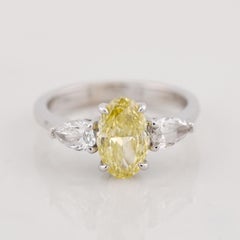 GIA Certified 1.20 Carat Fancy Yellow Oval Cut Diamond 18K Gold Ring