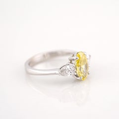 GIA Certified 1.20 Carat Fancy Yellow Oval Cut Diamond 18K Gold Ring