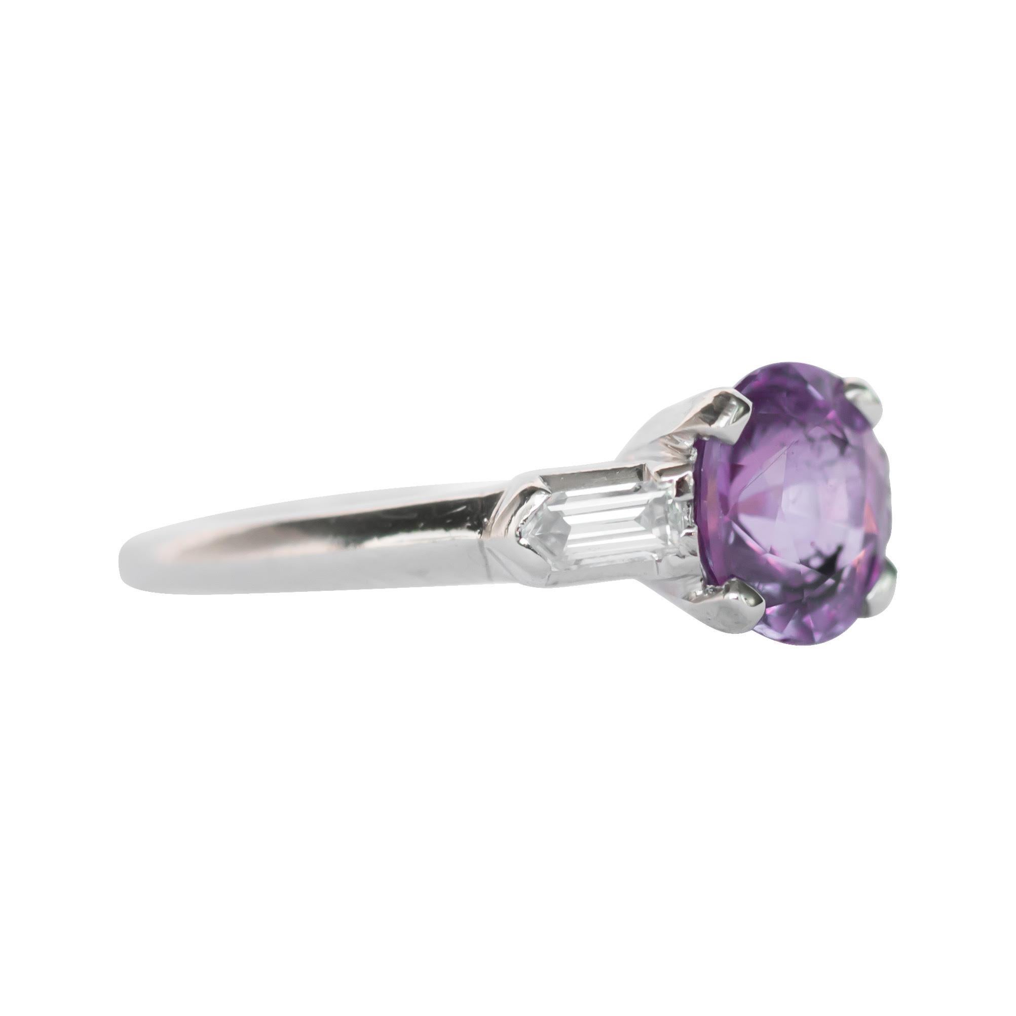 Ring Size: 5.25
Metal Type: Platinum
Weight: 2.7 grams

Center Color Stone Diamond Details
GIA CERTIFIED Center Diamond - Certificate # 2195496098
Shape: Brilliant and Step Cut 
Carat Weight: 1.20 carat
Color: Purple-Pink


Side Stone Details: