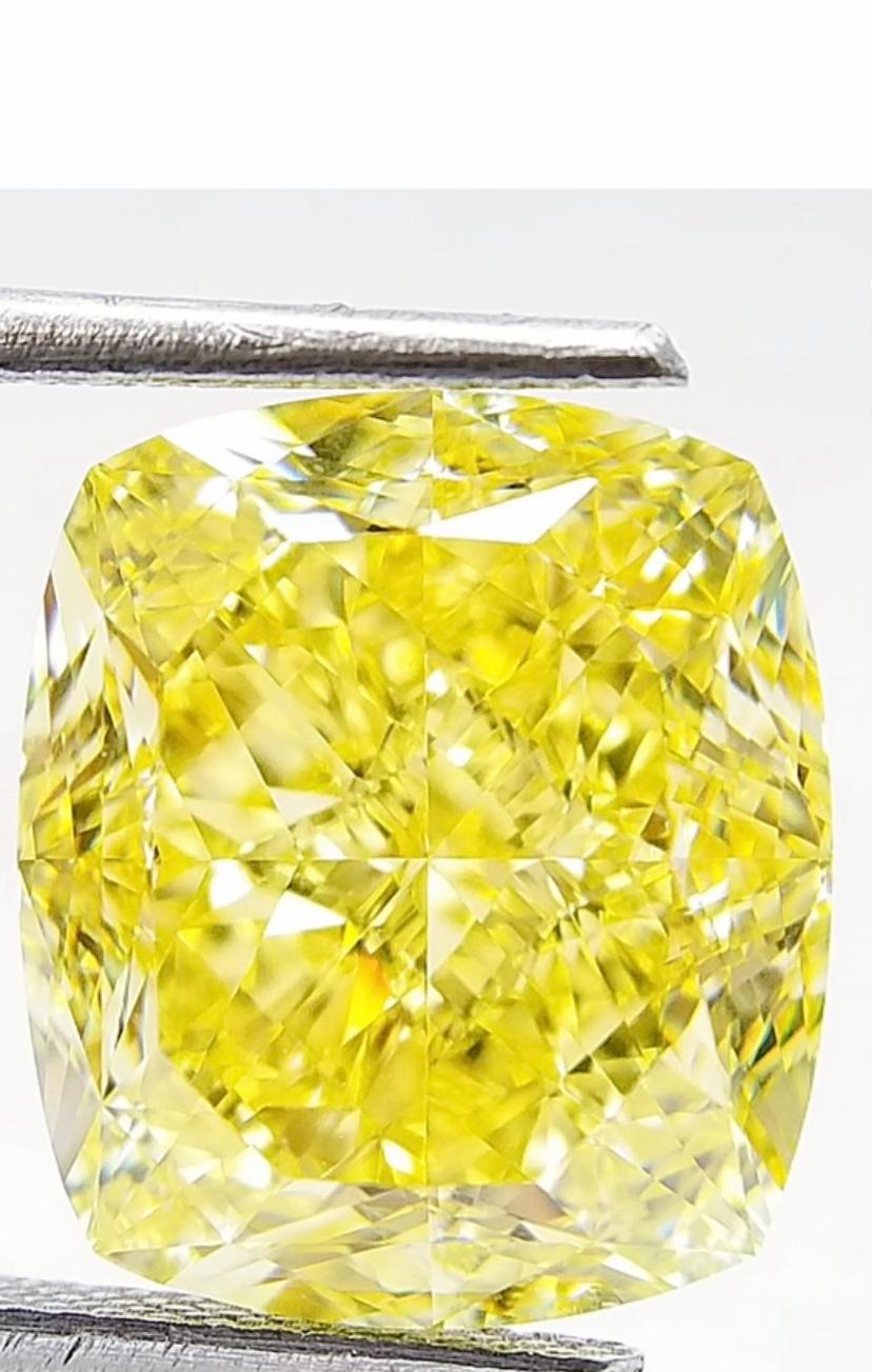 A stunning piece, GIA certified Natural Fancy Intense Yellow Diamond, in perfect cushion cut, of 12,00 Carats, VS2 clarity , spectacular color.
Investment diamond.
Complete with GIA certificate.
Whosale price .

Note: there is available also