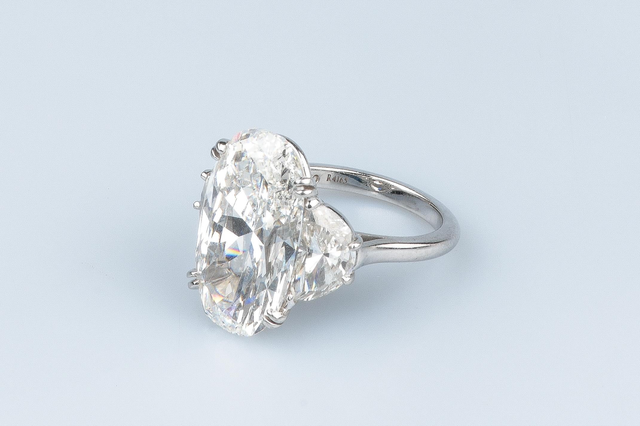 GIA certified 12.09 carat oval cut diamond For Sale 8