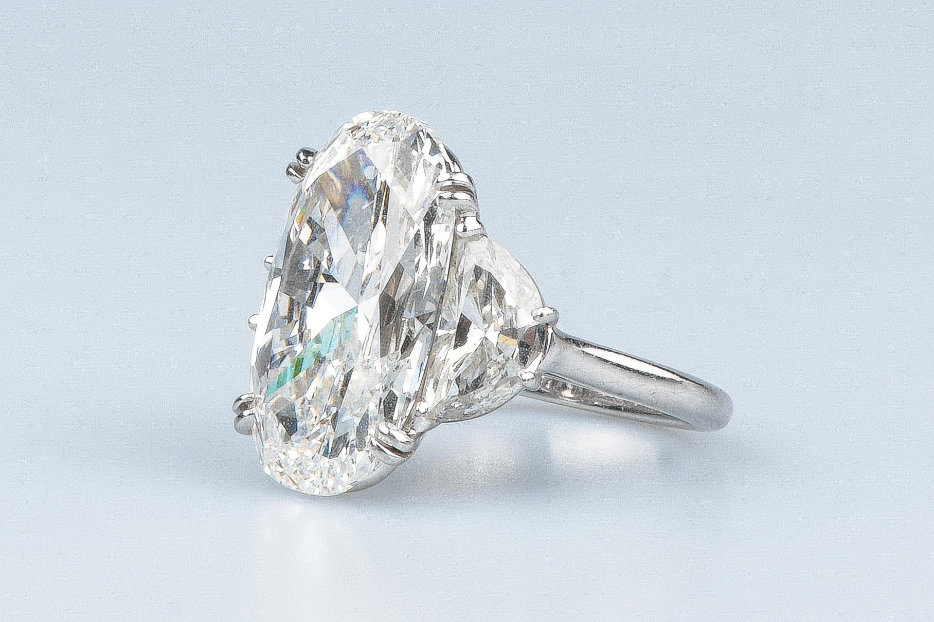 GIA certified 12.09 carat oval cut diamond For Sale 10