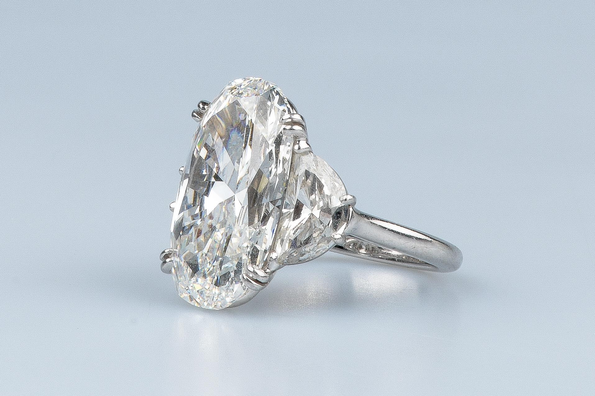 GIA certified 12.09 carat oval cut diamond For Sale 12
