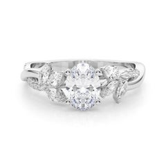 Anello con diamante in platino certificato GIA da 1,20 carati, ovale e intrecciato, con fiore da giardino e vite.