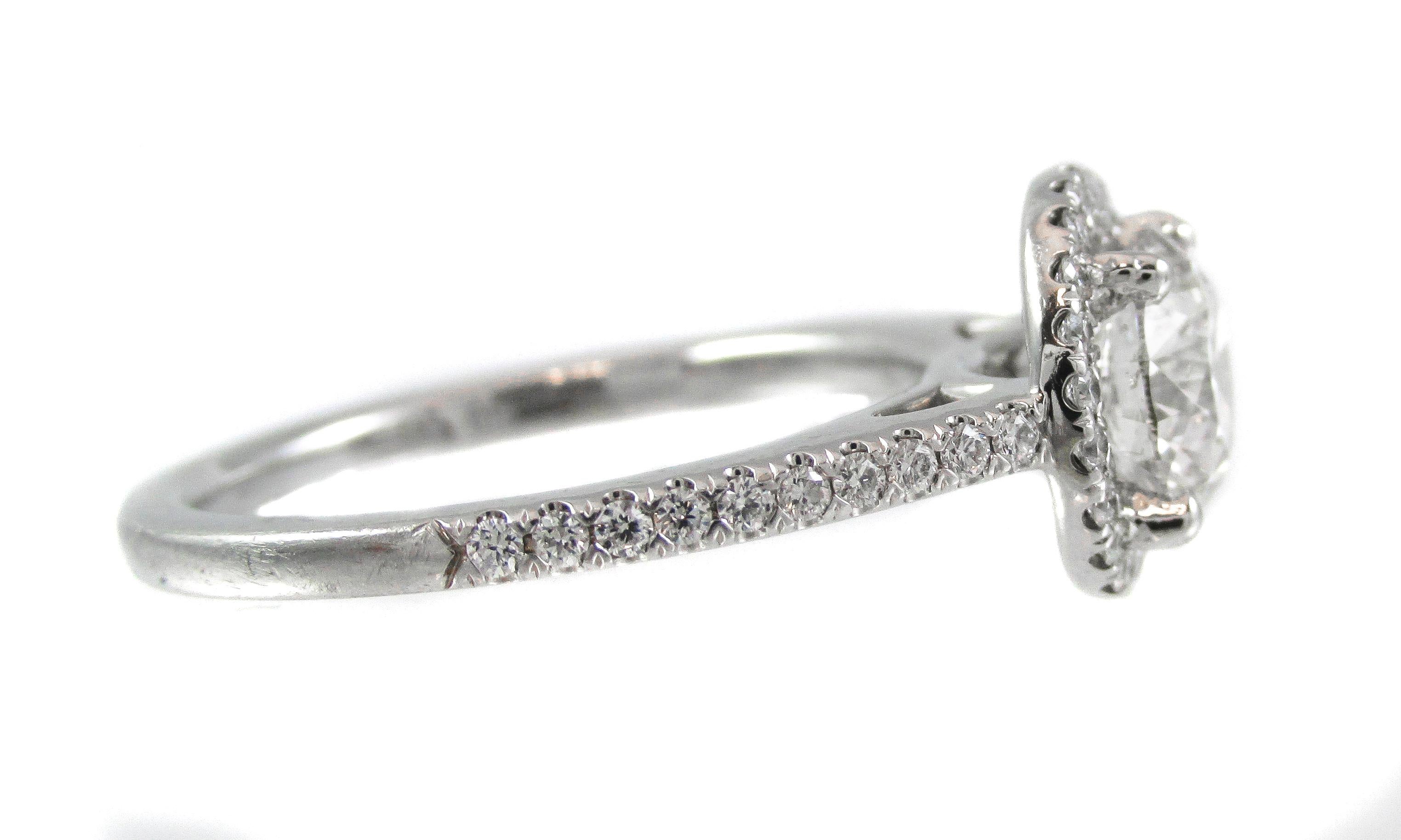 Contemporary GIA Certified 1.21 Carat Diamond Halo Luxurious Platinum Engagement Ring