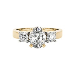 Anello con diamante ovale e rotondo a tre pietre in oro giallo 18 carati certificato GIA da 1,21 carati