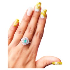 Anello con diamante certificato GIA da 1,21 carati di colore verde molto chiaro con purezza VS2