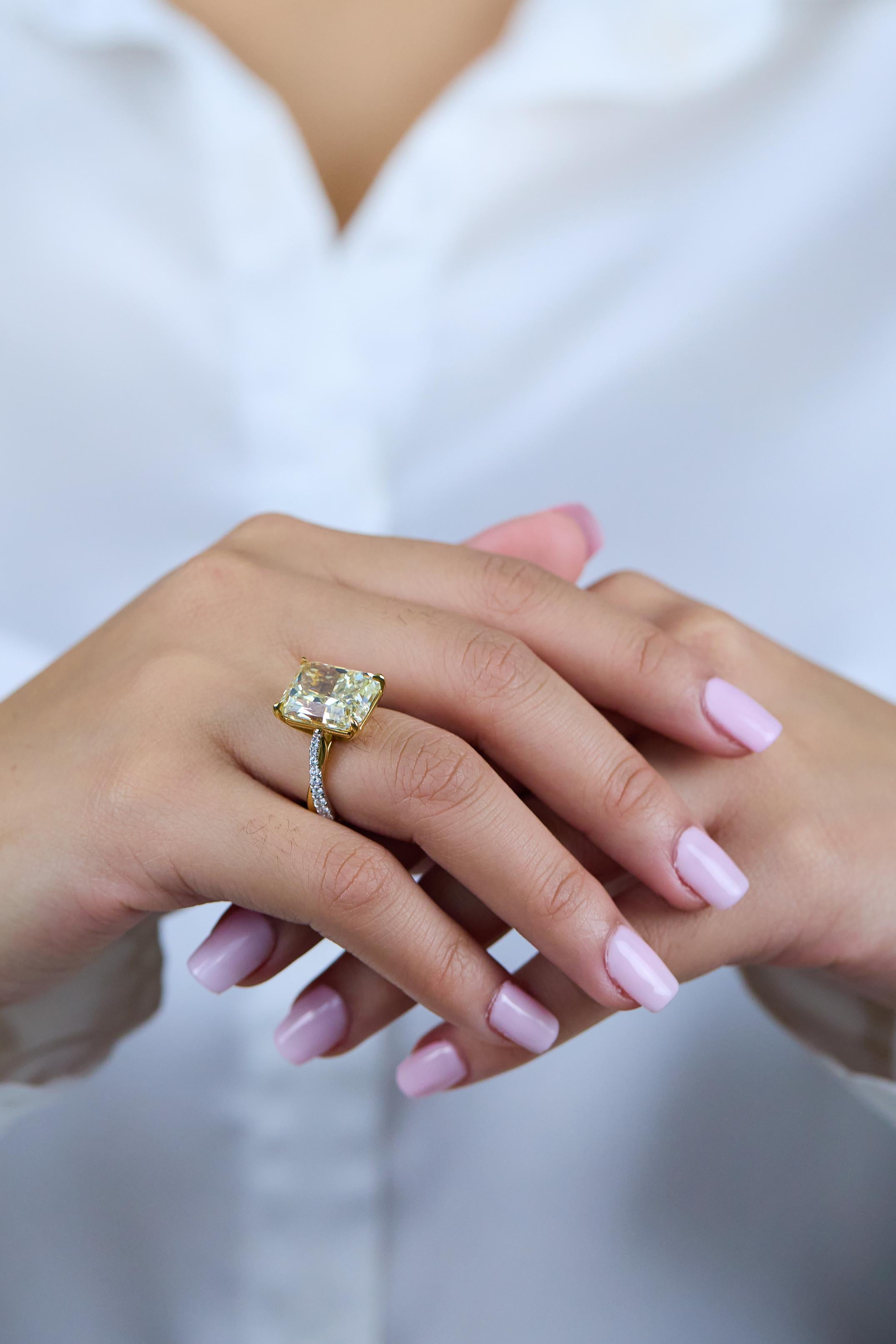 GIA Certified 12.16 Carats Radiant Yellow Diamond Twisted Band Engagement Ring In New Condition For Sale In New York, NY