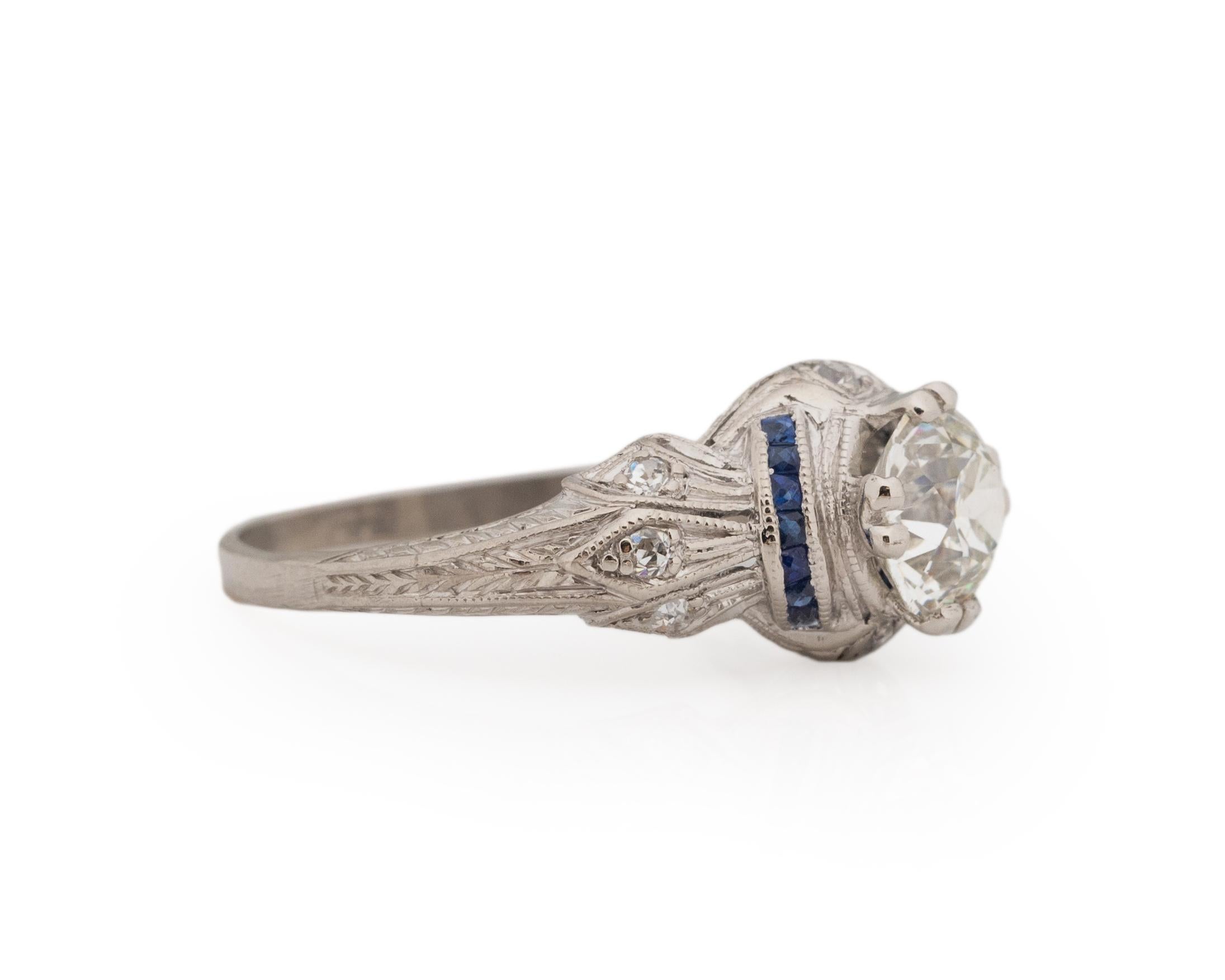 Ring Size: 7
Metal Type: Platinum [Hallmarked, and Tested]
Weight: 3.5 grams

Center Diamond Details:
GIA REPORT #: 2225175138
Weight: 1.22ct
Cut: Old European brilliant
Color: J
Clarity: VS2
Measurements: 7.01mm x 6.59mm x 4.18mm

Side Stone