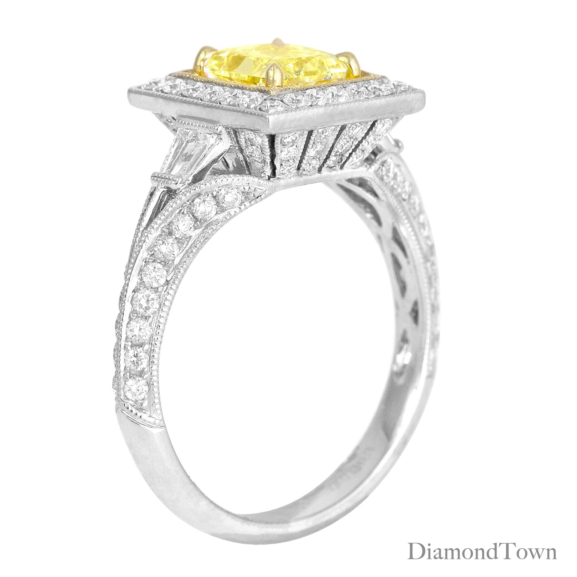 (DiamondTown) This gorgeous ring has a GIA Certified Natural Fancy Yellow SI1 Radiant Cut center measuring 1.22 carats, surrounded by a halo of round white diamonds. Additional diamonds decorate the side shank.

Center: 1.22 Carat Radiant Cut,