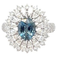 Anillo de oro con espinela azul sin tratar, de corte ovalado y 1,22 quilates, certificado por el GIA
