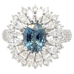 Anillo de oro con espinela azul sin tratar, de corte ovalado y 1,22 quilates, certificado por el GIA