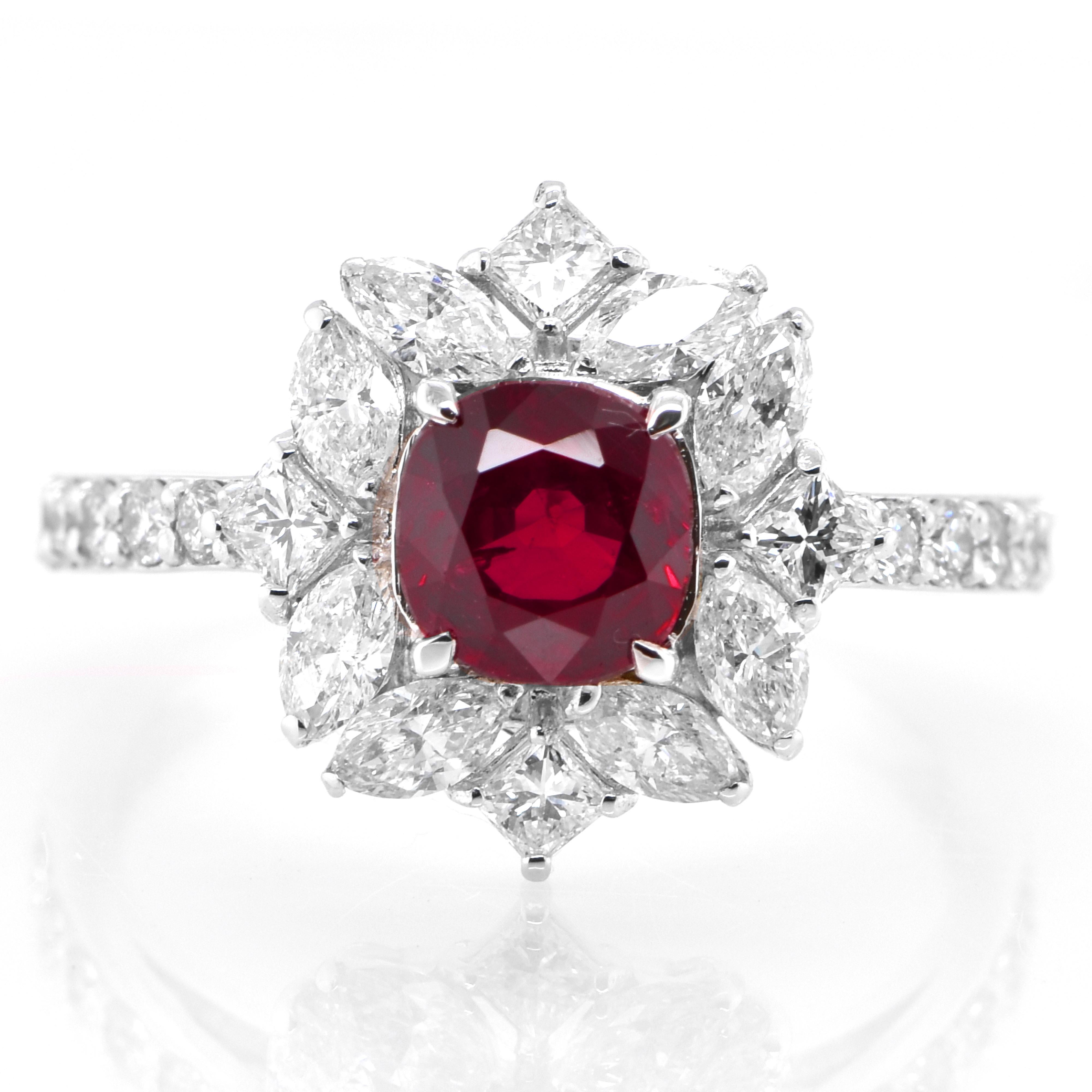 A beautiful ring set in Platinum featuring a GIA Certified 1.23 Carat Natural, Thailand (Siam) Ruby and 0.96 Carat Diamonds. Rubies are referred to as 
