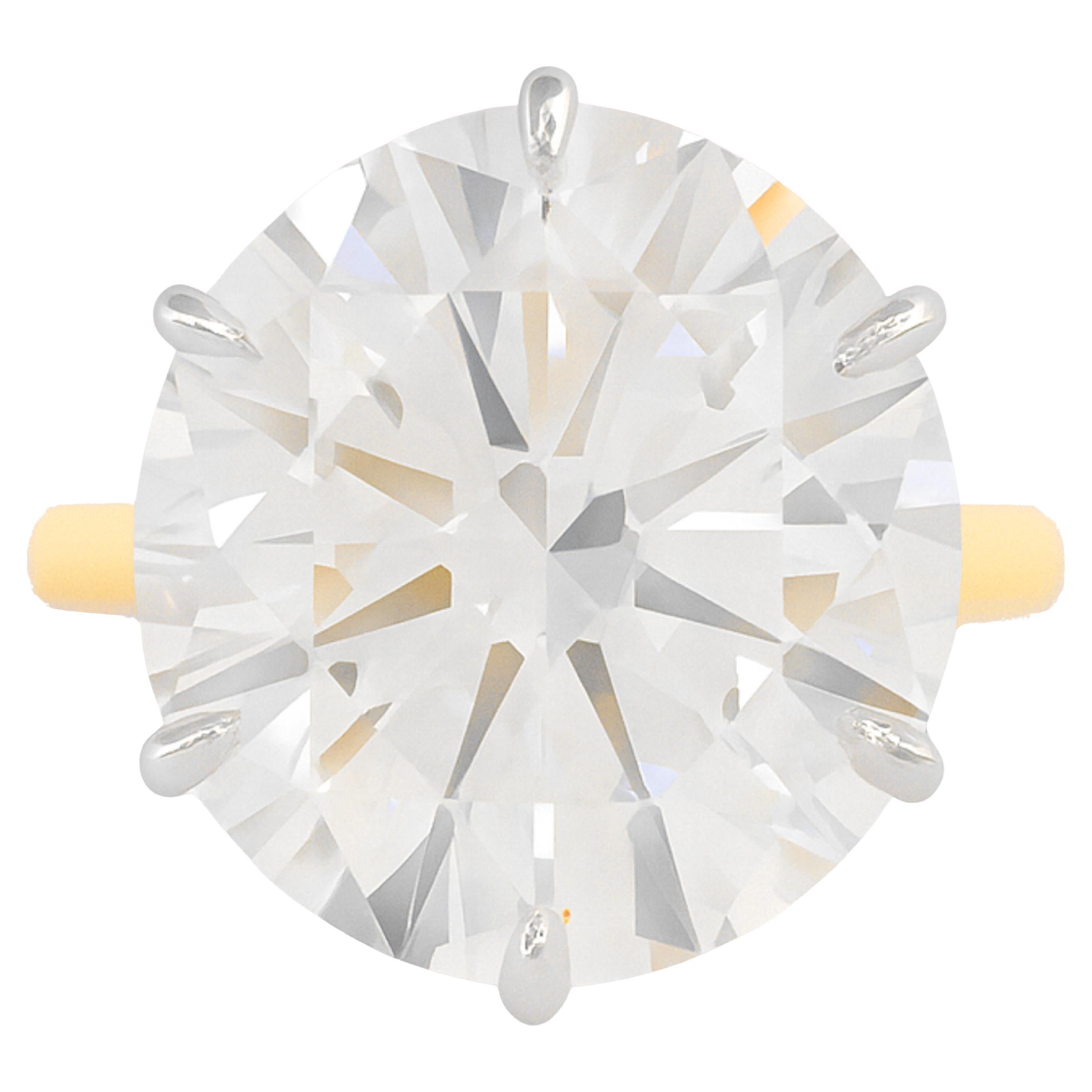 12.30 Carat Type IIa Round Brilliant Cut Diamond Engagement Ring – 18K Yellow Gold & Platinum

This exceptional solitaire engagement ring features a Natural Round Brilliant Cut Diamond weighing 12.30 carats, GIA Certified with the rare Type IIa