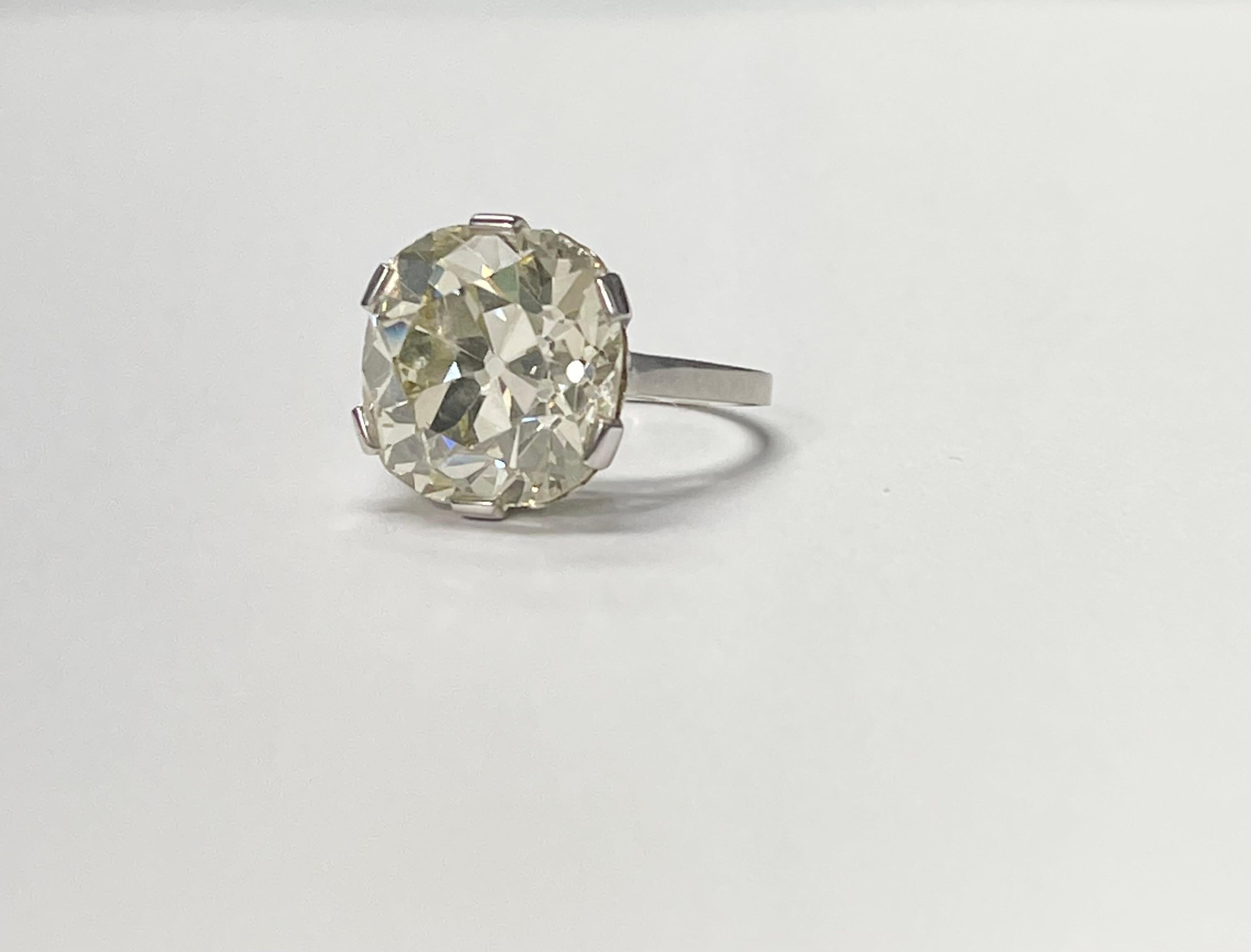 GIA Certified 12.32 Carat Old Mine Cushion Diamond Engagement Ring in Platinum  In Excellent Condition For Sale In New York, NY