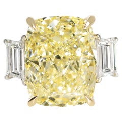 Used GIA Certified 12.34 Carat Fancy Light Yellow Cushion Cut Diamond Ring