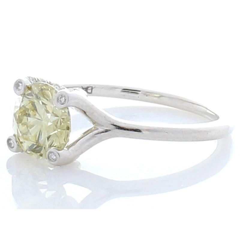 Contemporary GIA Certified 1.24 Carat Fancy Light Yellow Round Diamond Cocktail Ring