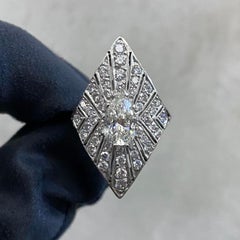 GIA Certified 1.24 Carat J VS2 Pear Brilliant Cut Diamond Shield Ring Platinum