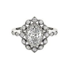 GIA Certified 1.24 Carat Oval Double Halo Flower 18K White Gold Diamond Ring